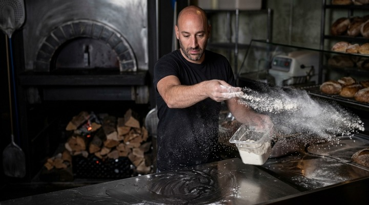 World’s No. 10 Pizza Chef Found in New Jersey! Food Lovers Celebrate Dan Richer scattering pizza flour