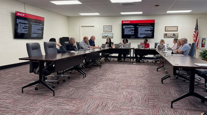 A School Training Session That Sparked Unexpected Teacher Reactions Educators sitting around conference table